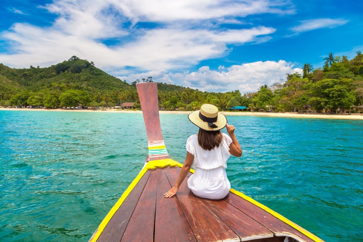 A female traveler taking a boat ride with views of punta cana